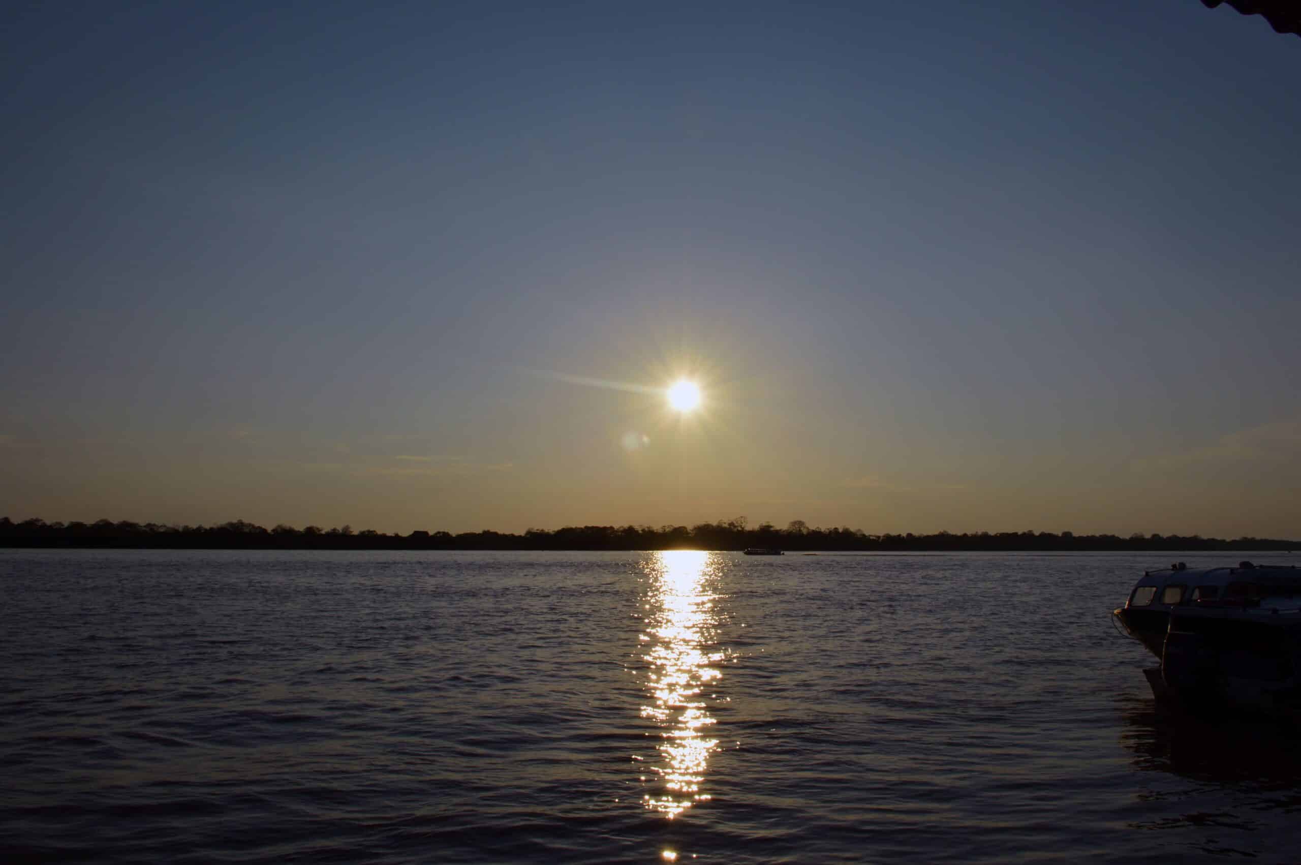 Sunset in the Amazon river - Phoenix Travel Group